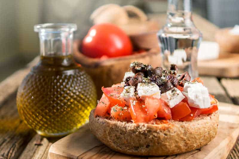 Traditional Cretan Ntakos / Dakos recipe (Rusks with tomatoes and feta cheese)