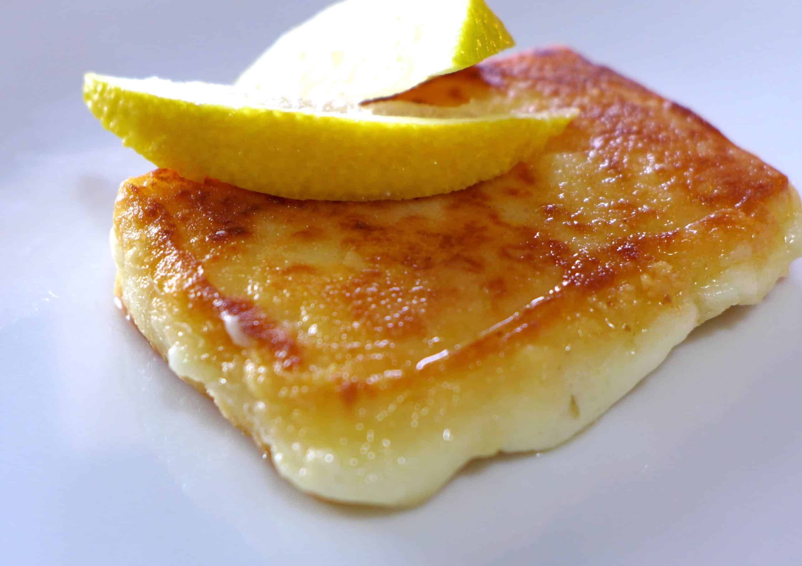https://www.mygreekdish.com/wp-content/uploads/2013/10/Greek-Saganaki-recipe-Pan-seared-Greek-cheese-appetizer-scaled.jpg