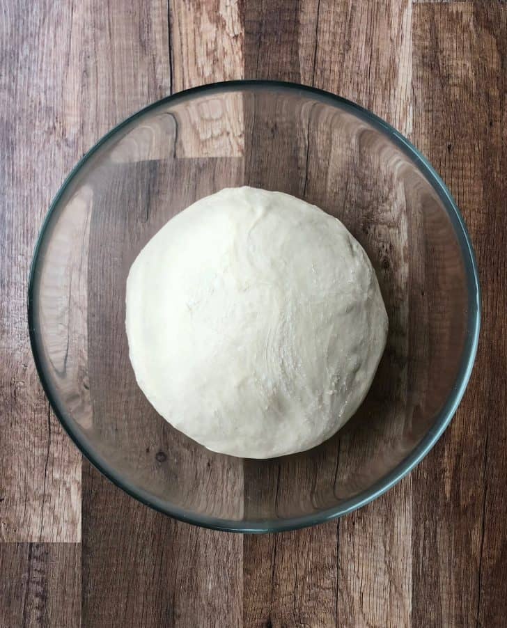 Greek Pita Bread cooking in a skillet